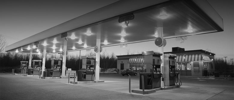 Background image of a gas station